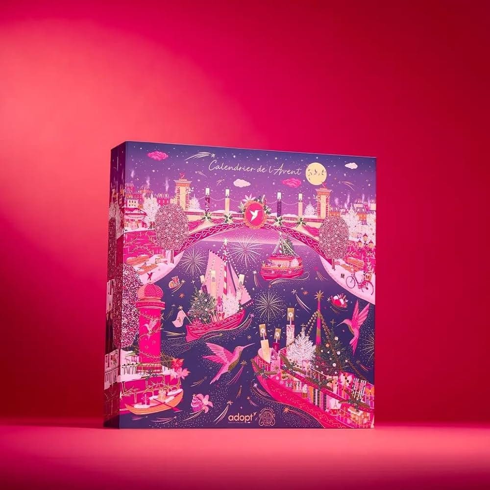 adopt parfum adventskalender: doos met een nachtelijke Seine, boten met kerstbomen en roze colibri's