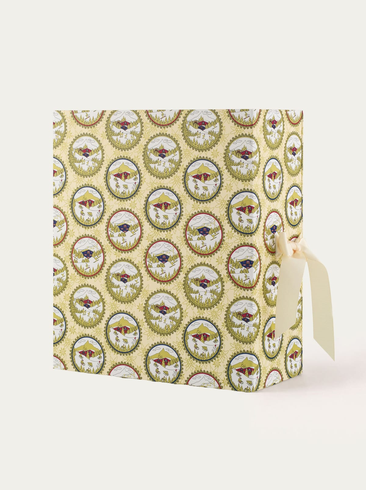 Gesloten Baobab Collection adventskalender Voyage Extraordinaire met medaillonprint en een strik