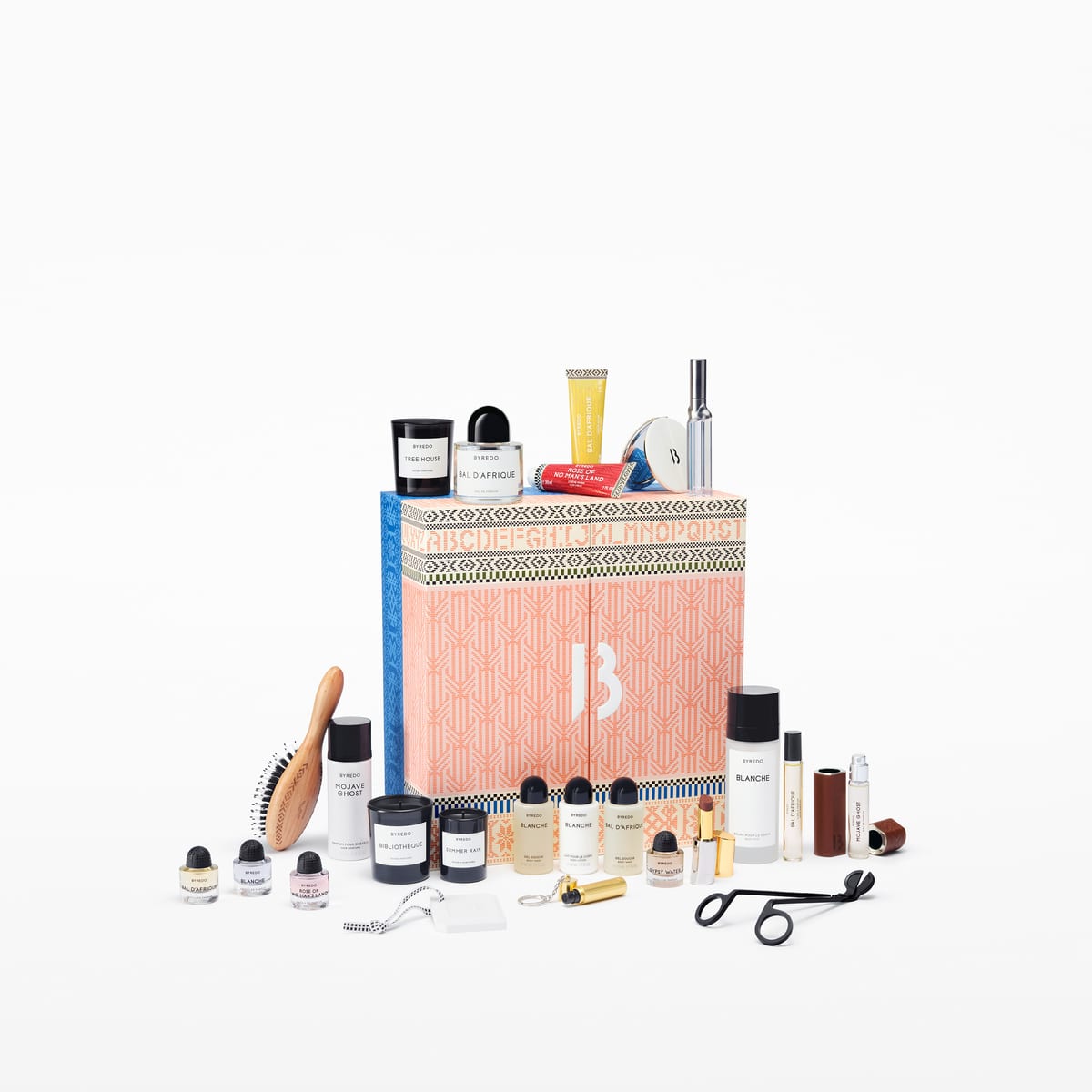 Byredo adventskalender: zalmroze doos met geweven patroon en een grote B, met alle producten eromheen