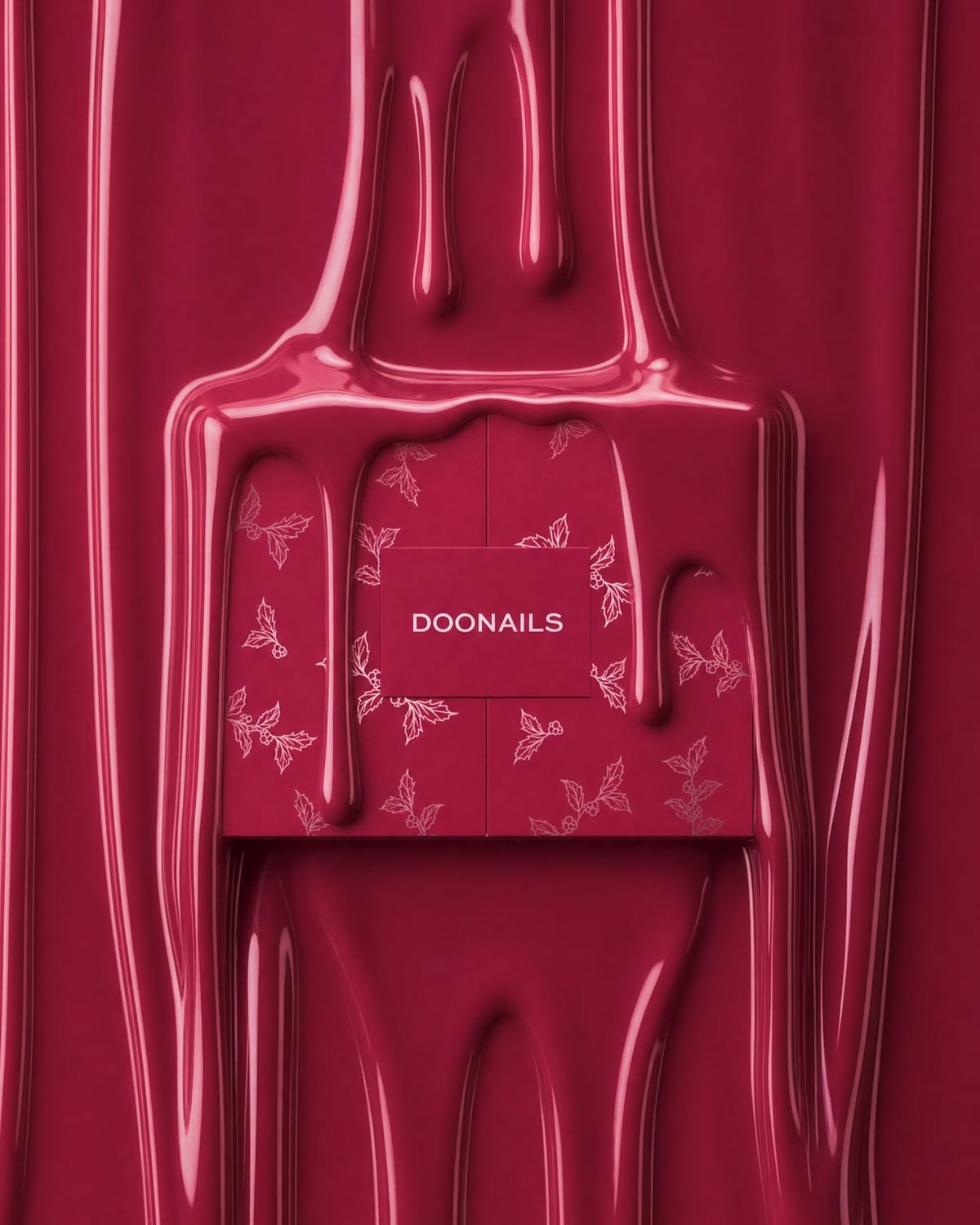 Bordeauxrode Doonails adventskalender met hulstbladeren, omringd door druipende rode nagellak
