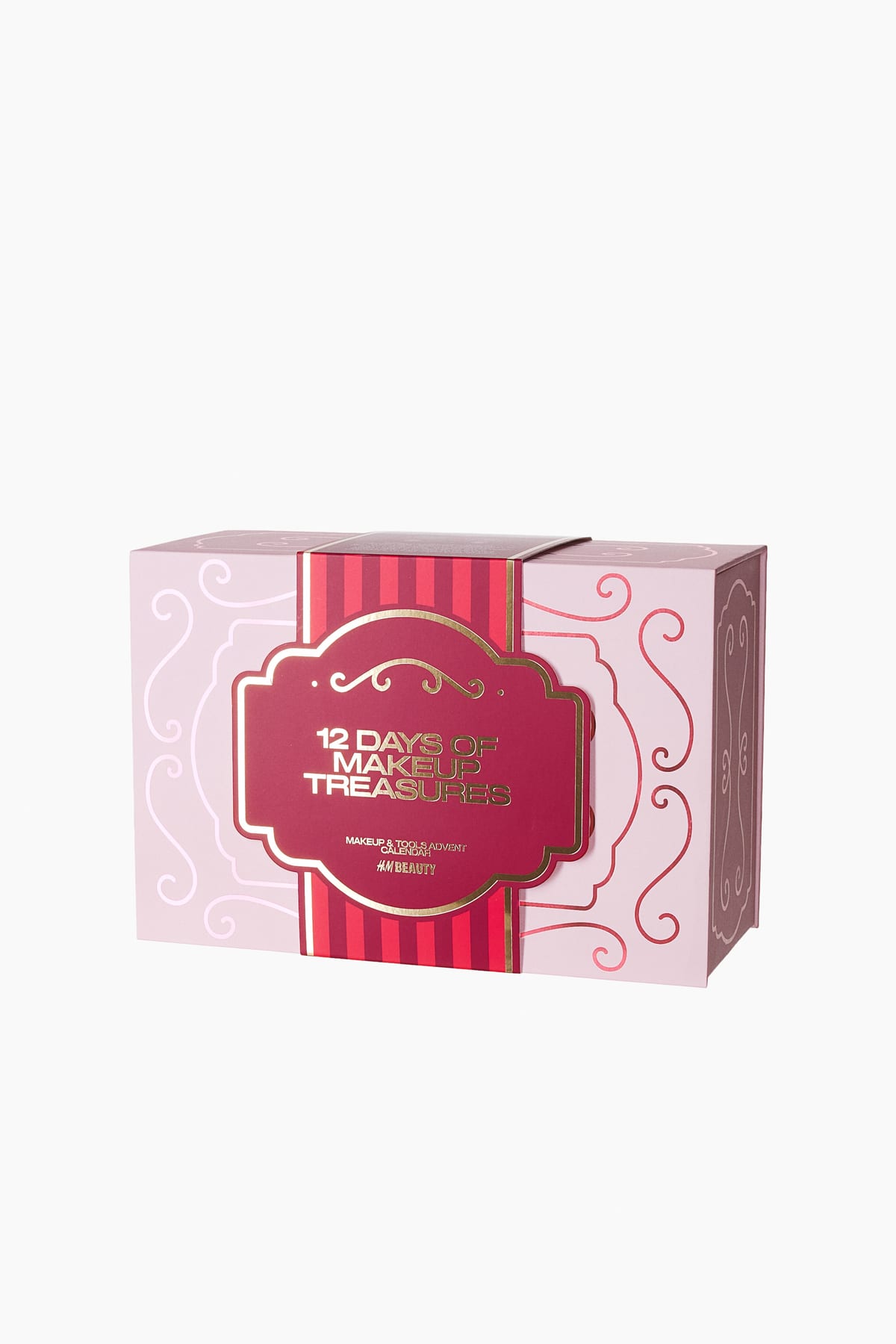 Roze H&M 12 Days of Makeup Treasures adventskalender met een rode band